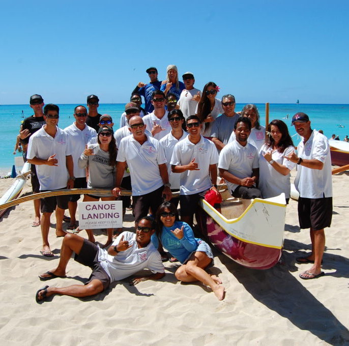 a group of people on a beach